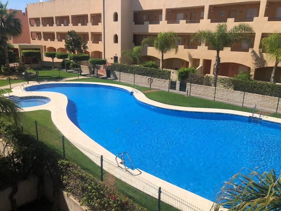 Bajo Con Jardin A Pie De Playa Y Piscina Comunitaria Con Jacuzzi Apartment Playas de Vera Ngoại thất bức ảnh